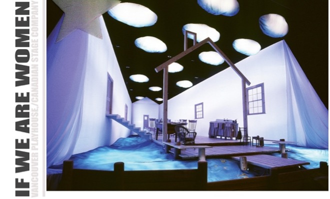 The image showcases an immersive theater set that features an abstract representation of a house frame with minimalistic furniture arranged on an elevated wooden platform surrounded by simulated blue water. Floating cloud-like forms decorate the ceiling, enhancing the dreamlike quality of the scene. The overall ambiance evokes contemplation and tranquility, characterized by cool lighting and soft shadows.