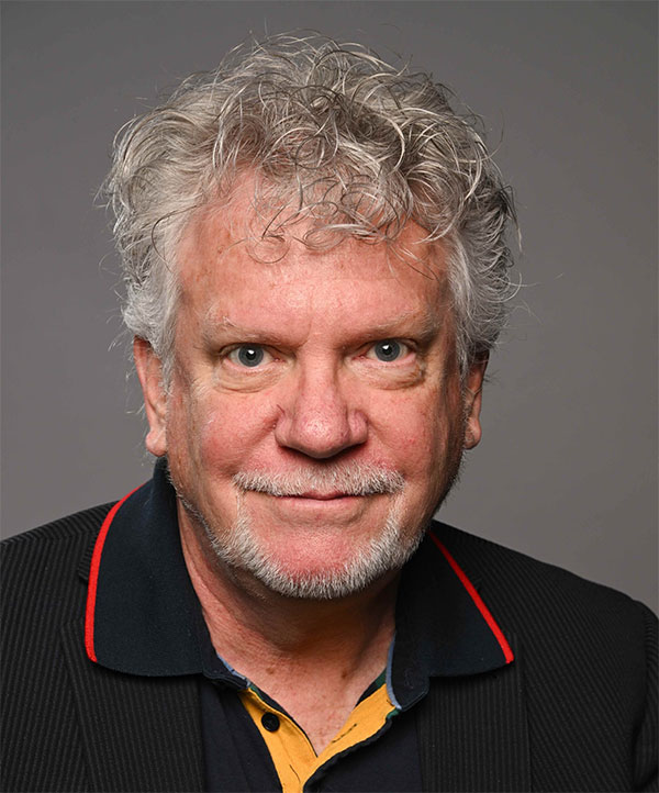 A portrait photo of Robert Thomson